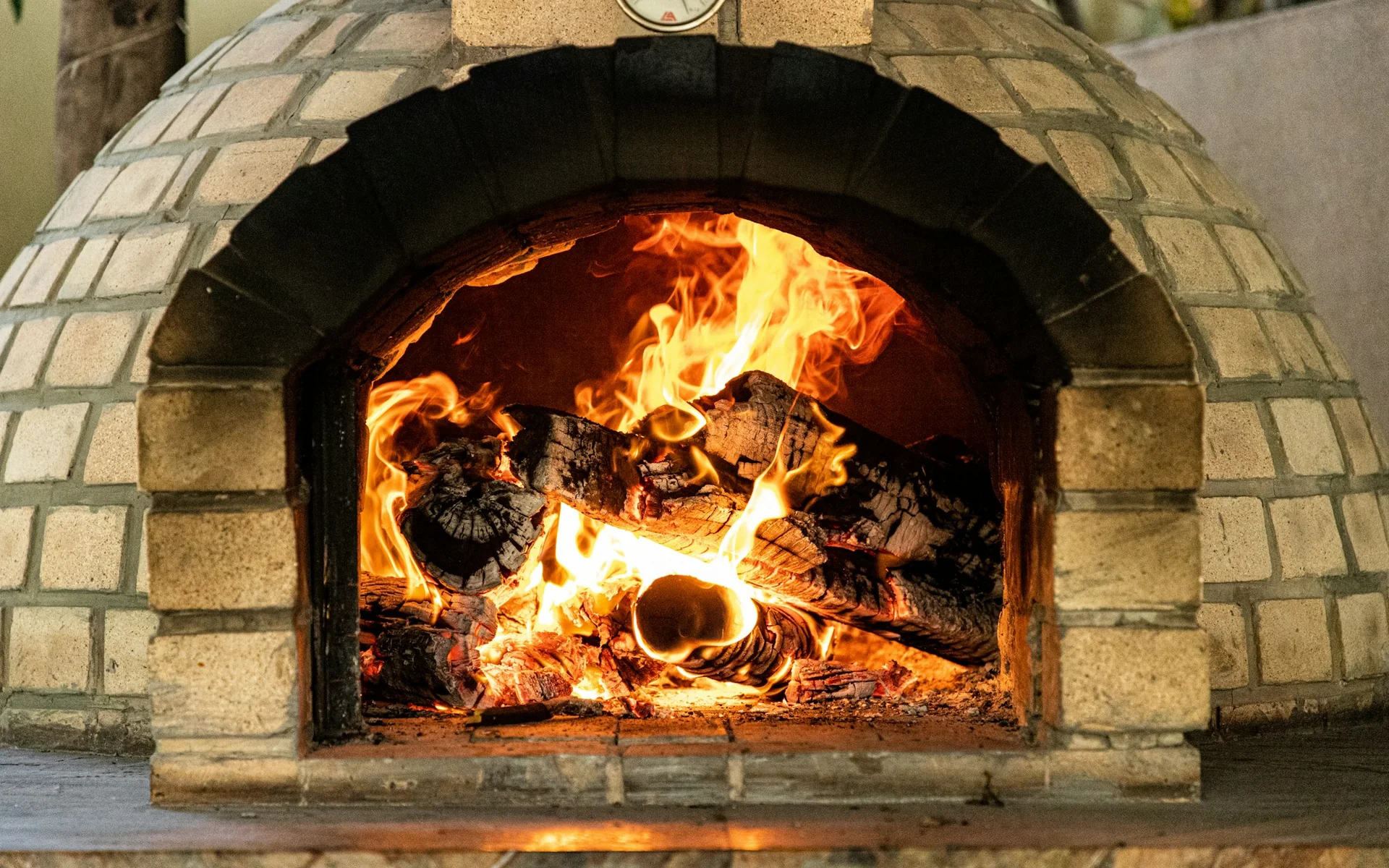 Wood burning in the pizza oven